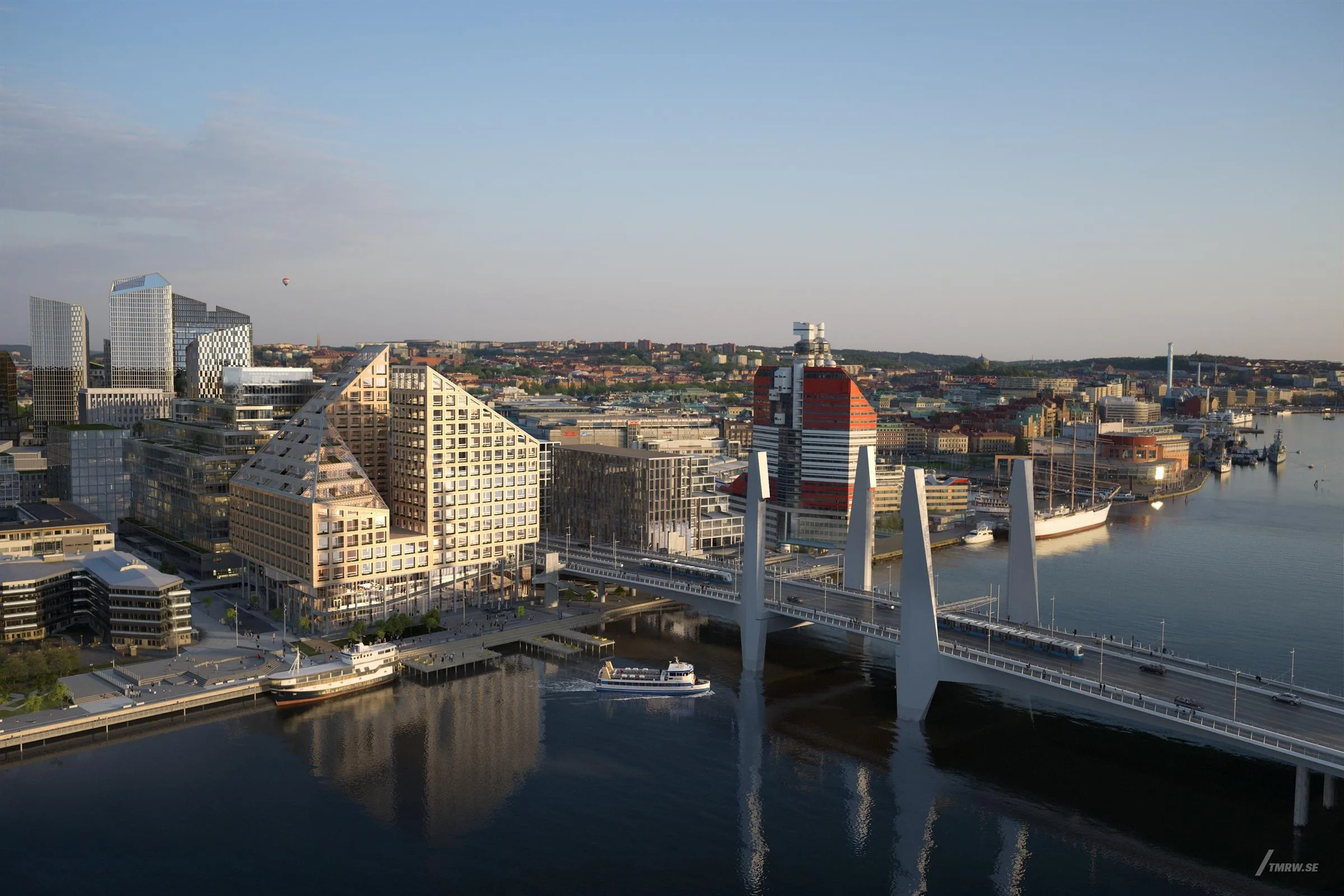 Vy över Göteborgs skyline med broar, moderna byggnader och vatten.